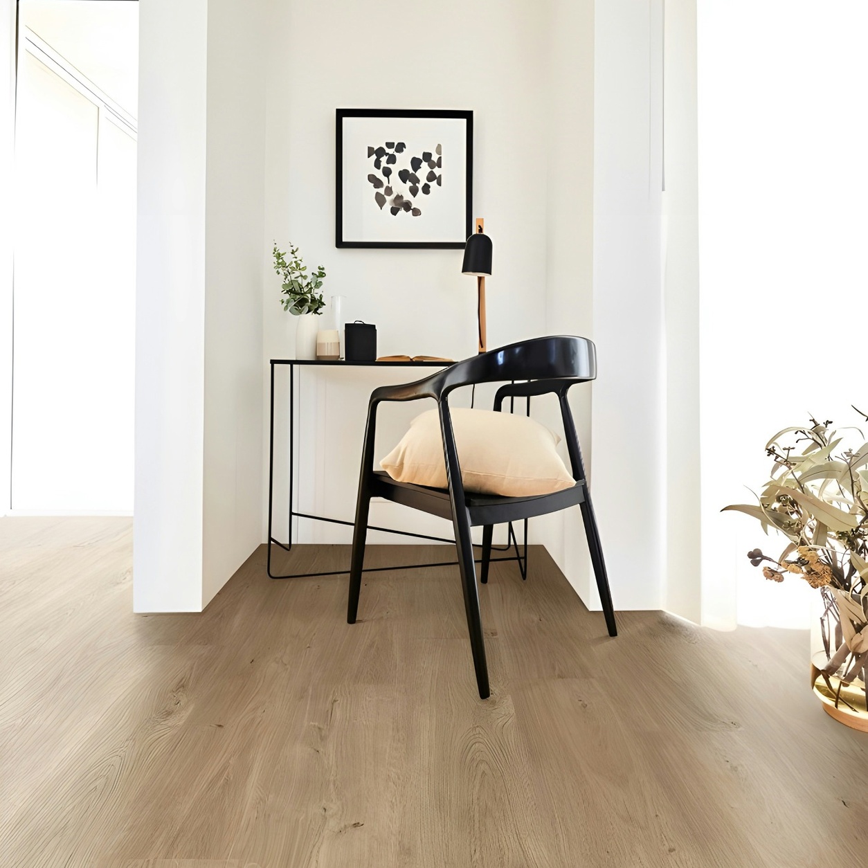 Modern home office featuring light oak laminate flooring professionally installed by Edmonton Flooring Ltd.