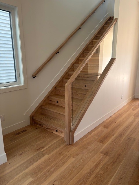 ardwood flooring installation on stairs in Edmonton