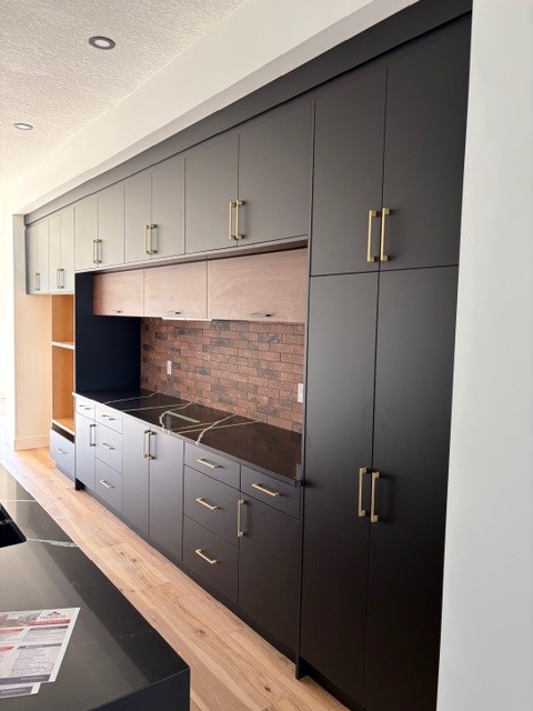 Kitchen backsplash and hardwood flooring renovation in Edmonton