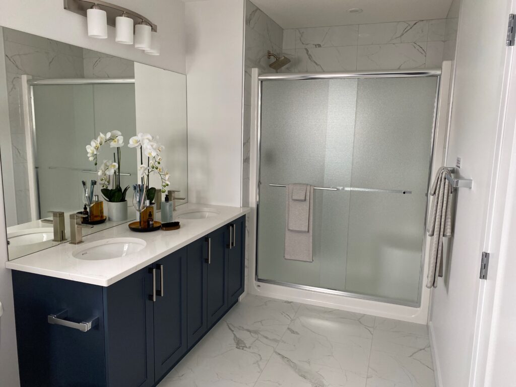 Modern bathroom renovation with custom tile work in Edmonton
