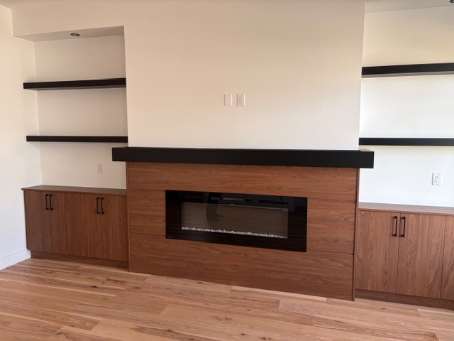 Living room hardwood flooring installation in Edmonton