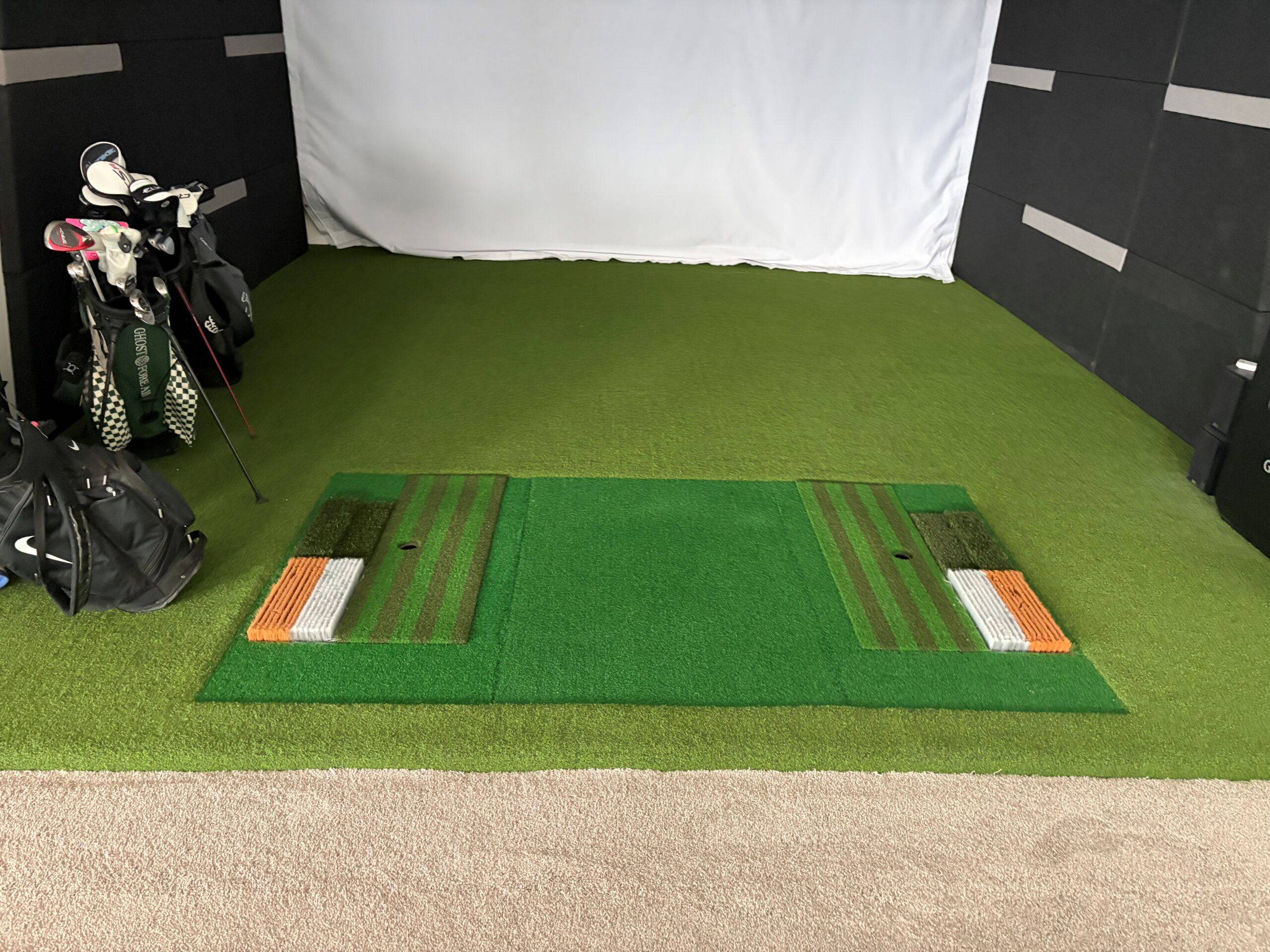 Indoor golf room carpet installation in Edmonton