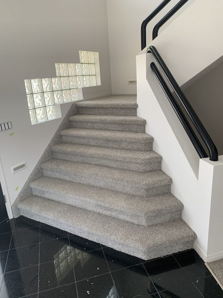 Carpeted staircase installation in Edmonton