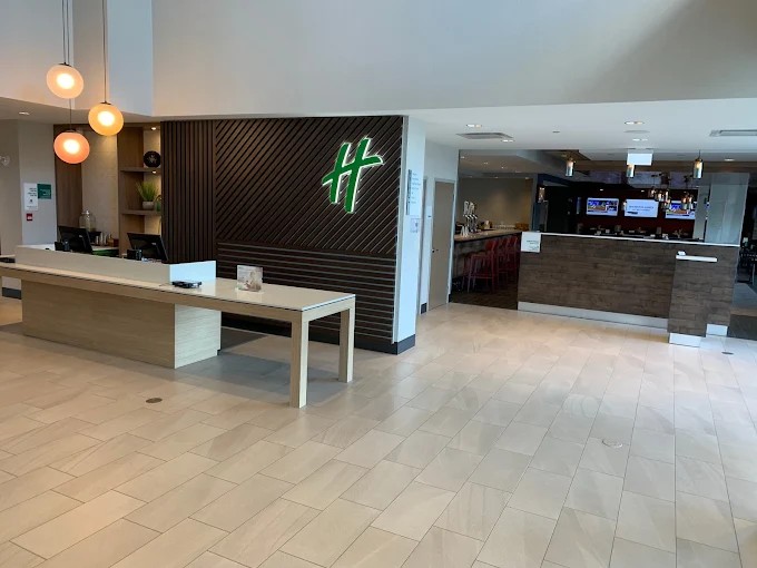 Modern tile flooring installation in commercial hotel lobby in Edmonton
