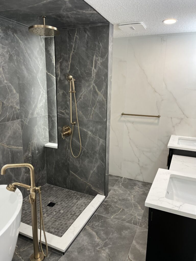 Walk-in shower renovation with modern tile in Edmonton