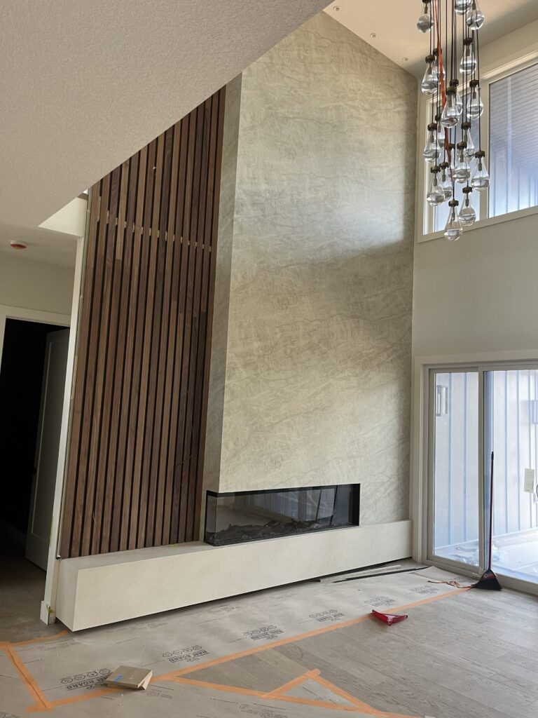 Modern fireplace renovation with custom tile in Edmonton