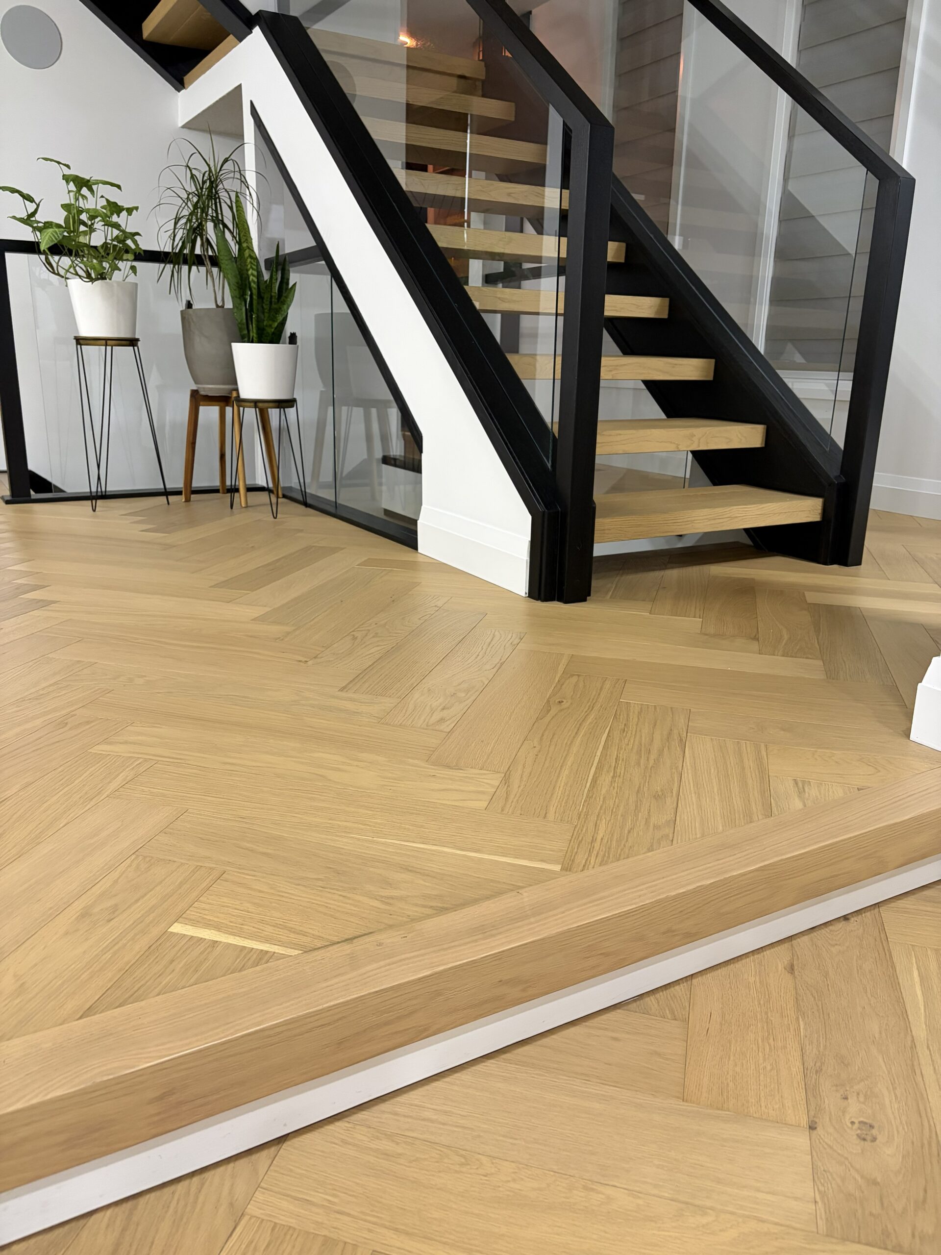 Herringbone hardwood flooring installation in Edmonton