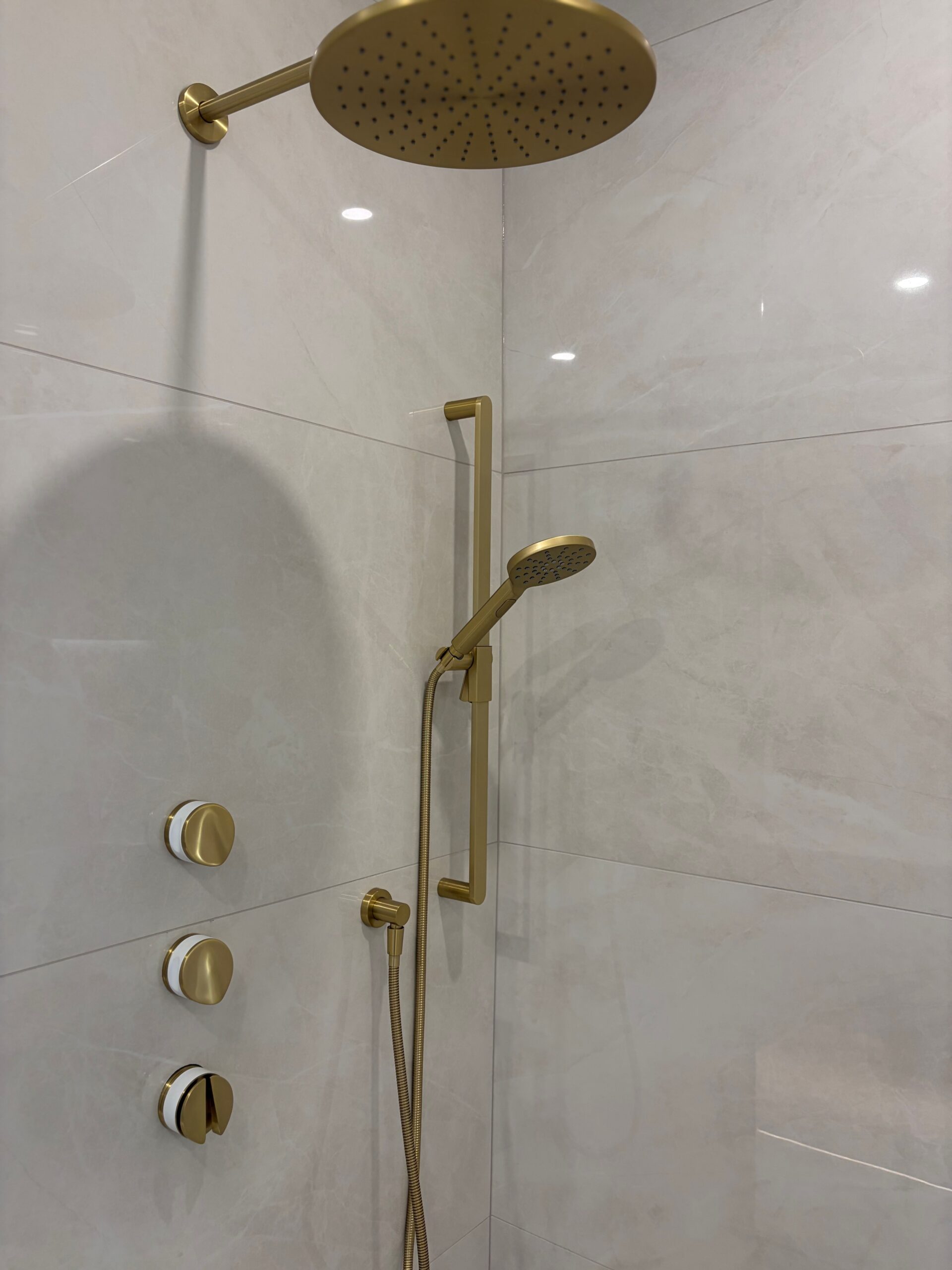 Modern custom shower with floor-to-ceiling tile in Edmonton
